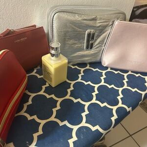 laura mercier silver metallic cosmetic pouch